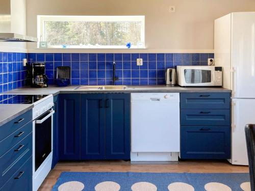 Η κουζίνα ή μικρή κουζίνα στο 4 person holiday home in KLINTEHAMN-By Traum