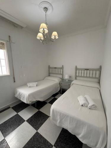 Ένα ή περισσότερα κρεβάτια σε δωμάτιο στο Apartamento Clavel