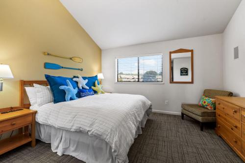 a bedroom with a large bed and a window at Full Ocean View-2 Decks-Heated Pool in Aptos