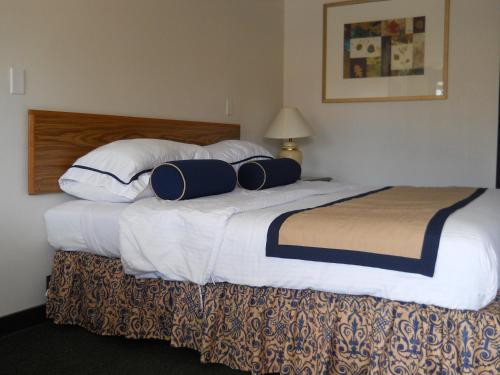 Postelja oz. postelje v sobi nastanitve Value Inn Motel - Milwaukee Airport South