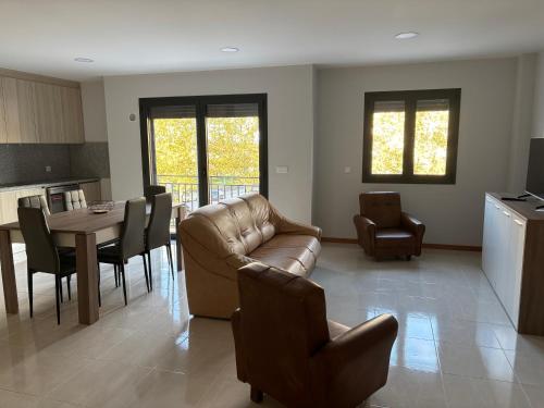 a living room with a couch and a table at Apartamento Duplex Bragança centro in Bragança