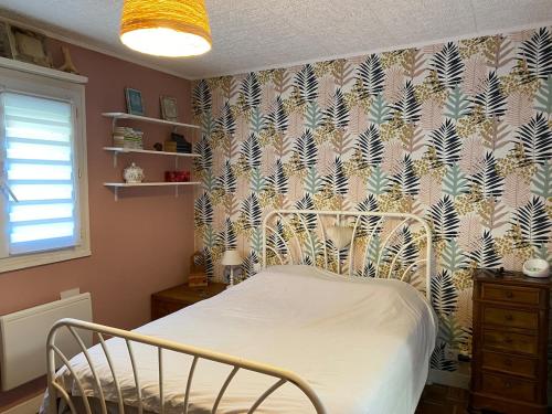 Ένα ή περισσότερα κρεβάτια σε δωμάτιο στο Maison familiale Tarnos, 4 chambres, jacuzzi