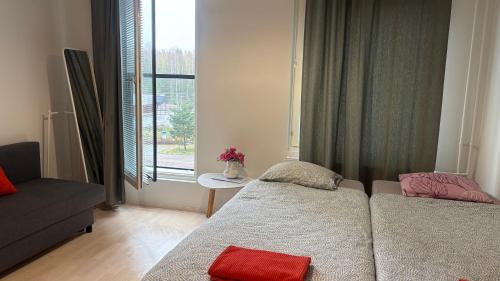 Postel nebo postele na pokoji v ubytování Entire Apartment Near Helsinki Airport in Kivistö