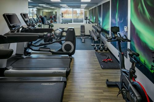 a fitness room with treadmills and cardio machines at Hyatt Place Fairbanks in Fairbanks