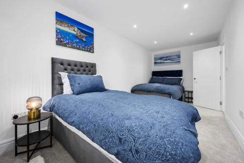 Ένα ή περισσότερα κρεβάτια σε δωμάτιο στο Luxury Apartment Heart of Didsbury