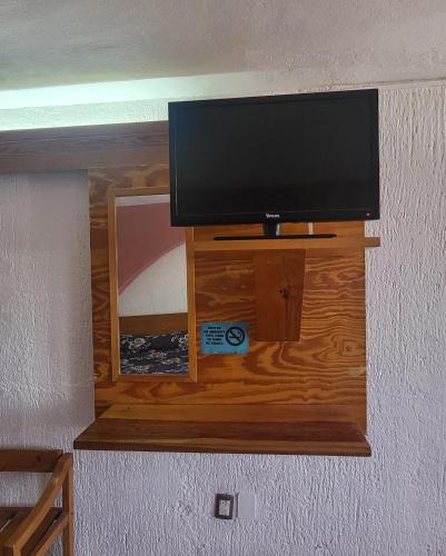 TV a/nebo společenská místnost v ubytování Hotel Ojo de Agua