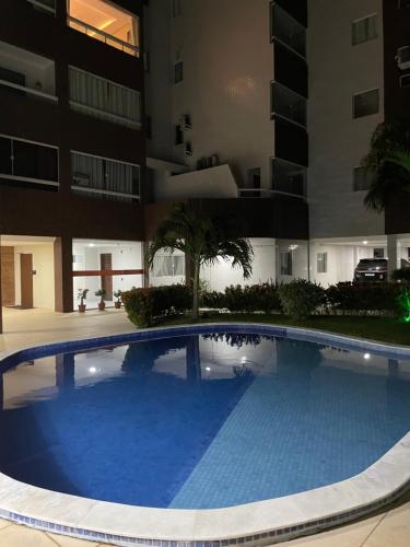 Bazén v ubytování Flat Luxxor 50 metros da praia Jacumã nebo v jeho okolí