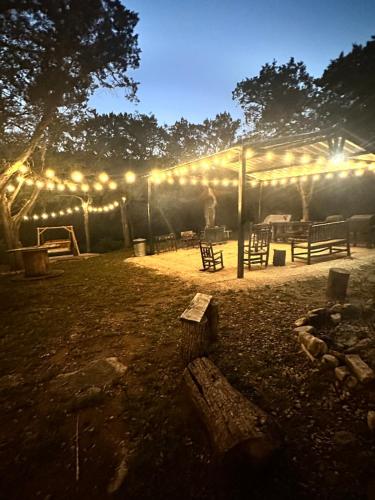 a lit up tent with a bunch of lights at Tiny house - Our little piece of paradise in Lakehills