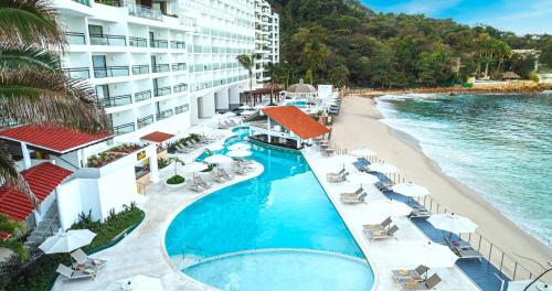 an aerial view of a resort with a swimming pool and a beach at Grand Park Royal Puerto Vallarta - All Inclusive in Puerto Vallarta