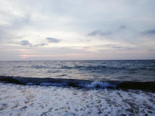 a view of the ocean from the beach at JUNGLE GYM LA UNION Prana fan kubo 2 pax in Rimus