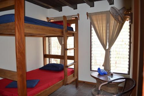Postel nebo postele na pokoji v ubytování El Castillo Divertido