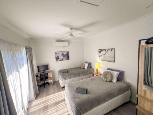 Postel nebo postele na pokoji v ubytování Bella Luna Beach Front - 2 bed