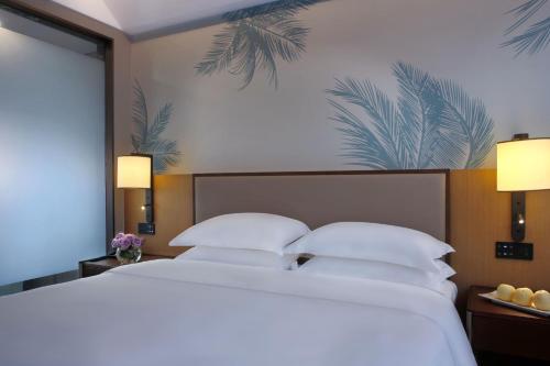 Sanya Han's Grace Hotelにあるベッド