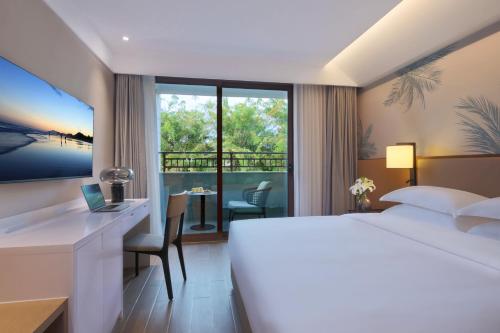 Sanya Han's Grace Hotelにあるベッド