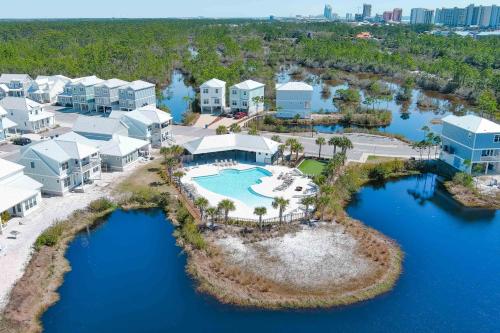 an aerial view of a resort with a swimming pool at Salty Shells by The Madison Liv Collection in Orange Beach