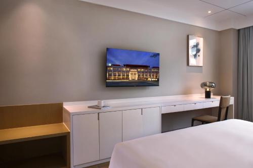 Sanya Han's Grace Hotelにあるテレビまたはエンターテインメントセンター