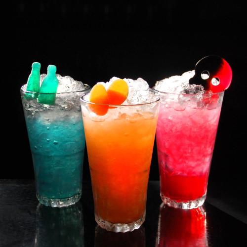 a group of three cocktails sitting on a table at Best Western Hotel Savoy in Karlstad