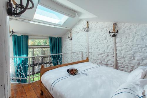 Postel nebo postele na pokoji v ubytování Dali Oldtown Deertrip Guesthouse