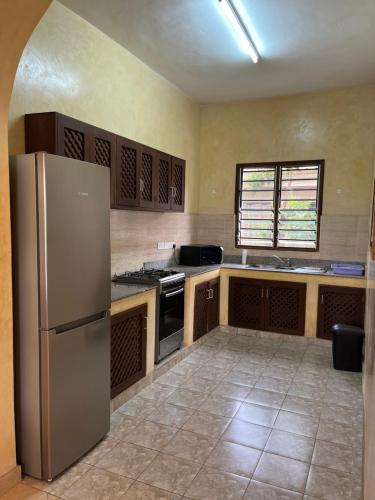 Cuisine ou kitchenette dans l'établissement Flametree Beach Homes
