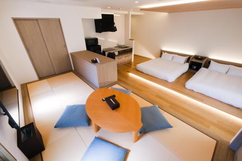 Ένα ή περισσότερα κρεβάτια σε δωμάτιο στο HOTEL ALL IN Kumamoto