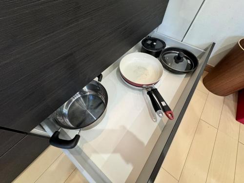 a pot on top of a stove in a kitchen at 白浜温泉付き貸別荘b-72 in Shirahama