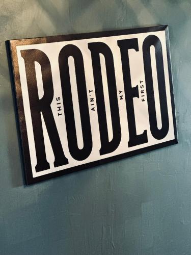 a black and white sign on a wall at 1 Bed1 Bath Condo Wkitchenlr-sleeps Up To 4pp in Russell