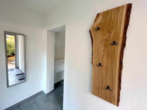 a room with a wooden door on the wall at wanderlutz in Baiersbronn