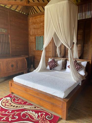 Giường trong phòng chung tại JOGLo D'bukit