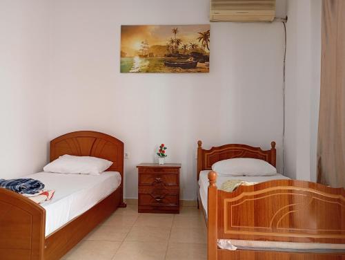 Postel nebo postele na pokoji v ubytování Rose Hostel