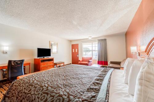 Ένα ή περισσότερα κρεβάτια σε δωμάτιο στο Lone Star Inn by OYO Vernon Texas Hwy 287