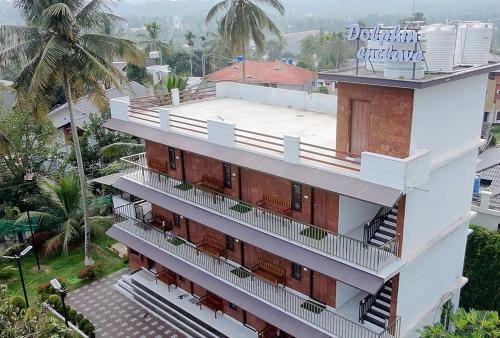 an aerial view of a building at DOLPHIN ENCLAVE SERVICE STUDIO APARTMENTS in Kalpetta