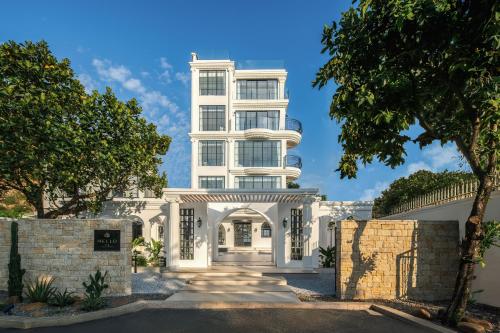 an image of a white building at Mello Hotel in Shenzhen