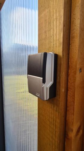 a window with a heater on a wooden wall at Rengerter Oase in Neunkirchen-Seelscheid