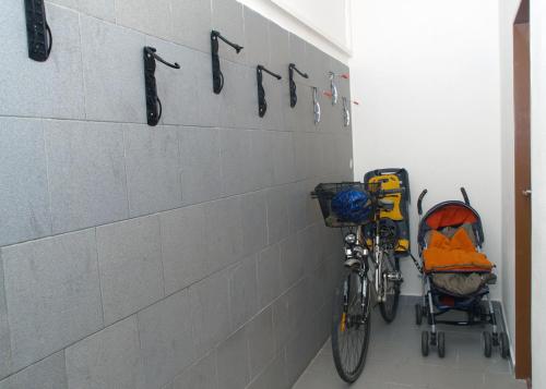 two bikes parked next to a wall with the wordfaith at Penzion U Třeboňského kola in Třeboň