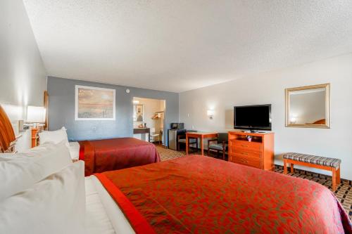 Ένα ή περισσότερα κρεβάτια σε δωμάτιο στο Lone Star Inn by OYO Vernon Texas Hwy 287