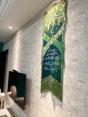 a sign on the wall of a room at 鹿莫思 Lumos in Qingshui