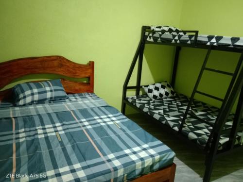 Postel nebo postele na pokoji v ubytování Medalla Homestay