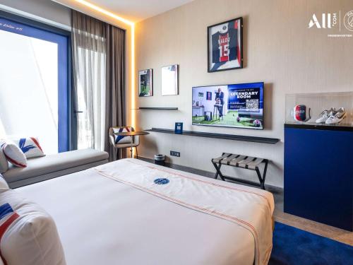 Télévision ou salle de divertissement dans l'établissement Novotel Abidjan Marcory