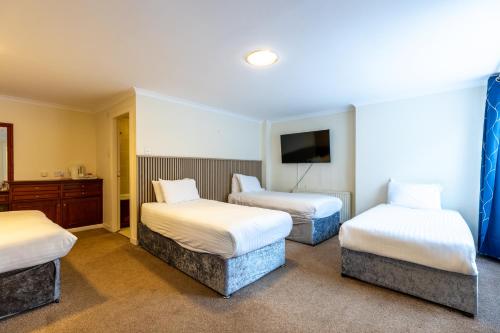 Ένα ή περισσότερα κρεβάτια σε δωμάτιο στο The Bein Inn Hotel & Restaurant