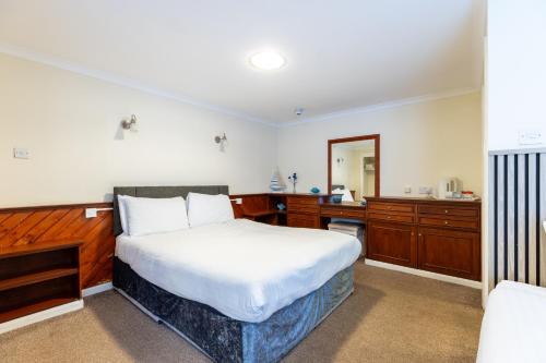 Ένα ή περισσότερα κρεβάτια σε δωμάτιο στο The Bein Inn Hotel & Restaurant