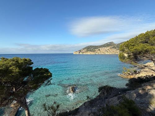 a view of the ocean from a cliff at Poolvilla Patricia - Camp de Mar in Andratx
