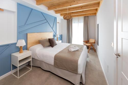 Postel nebo postele na pokoji v ubytování Nest Flats Triunfo