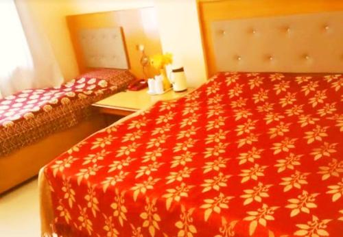 Postel nebo postele na pokoji v ubytování Hotel Mount View NXE