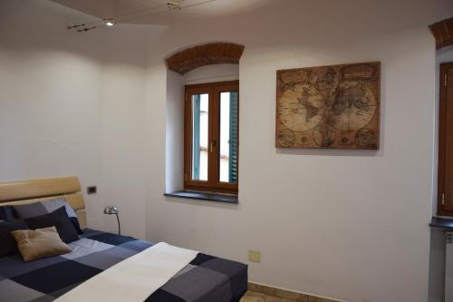 Katil atau katil-katil dalam bilik di San Giovanni Apartment Porto di Livorno