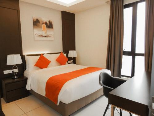 Ένα ή περισσότερα κρεβάτια σε δωμάτιο στο Grand Ion Delemen Hotel