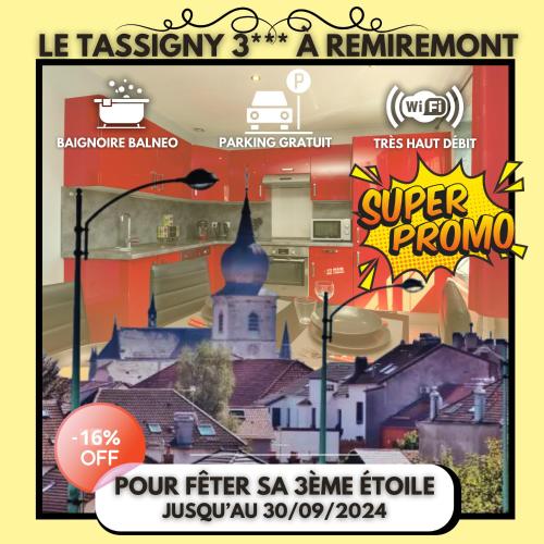 une affiche pour une super promo avec une photo d'une ville dans l'établissement Le Tassigny 3 étoiles - Hyper-Centre Balneo Wifi Parking, à Remiremont