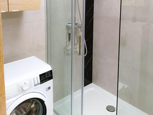 Ένα μπάνιο στο Nova Apartment In Orlik Residence