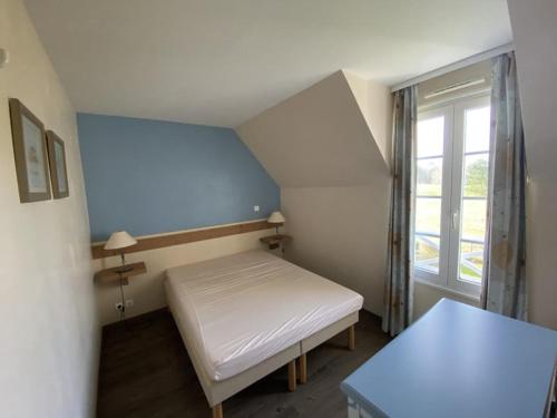 Postel nebo postele na pokoji v ubytování Belle Dune Quartier Les Eaux Vives