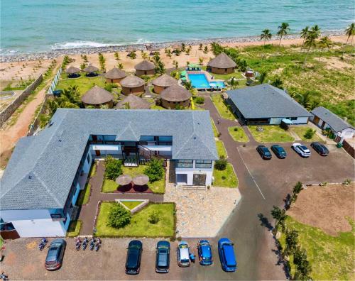 an aerial view of a house on the beach at Lemon Beach Resort in Elmina