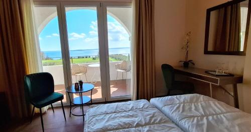 Postel nebo postele na pokoji v ubytování La Kascina Suite & Rooms